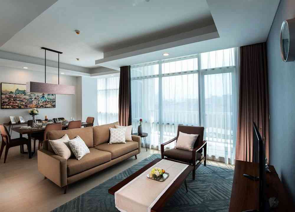 Ruang keluarga Oakwood Suites La Maison